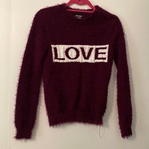 Fuzzy purple sweater